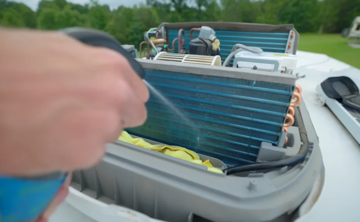 Rooftop AC capacitor swap at Holiday Park Campground Benbrook