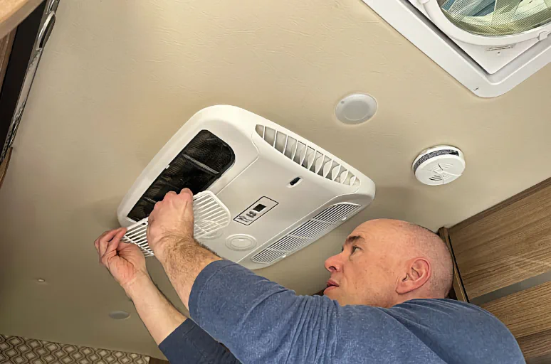 Rooftop AC capacitor swap on-site in West Palm Beach, FL