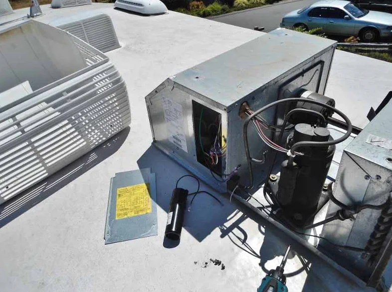 Rooftop AC capacitor swap on a Class A motorhome staged at Westfield Southcenter in Tukwila