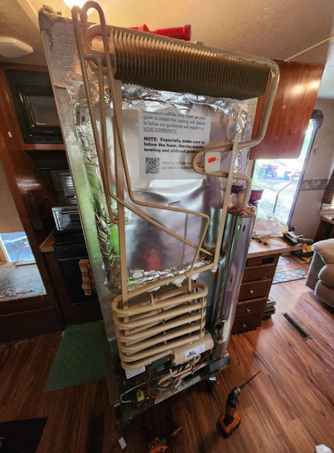 Norcold absorption fridge service on a Class C at a US-192 corridor resort in Kissimmee