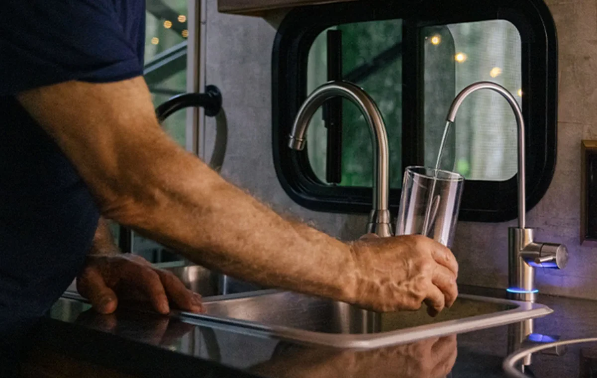 PEX water-line repair under a fifth-wheel coach in Florida