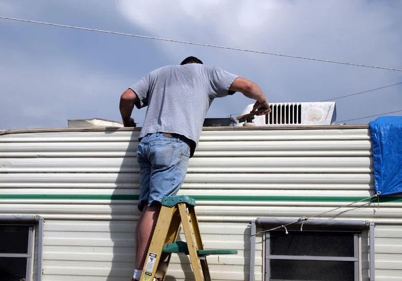 Post-Nicole roof reseal on a long-stay fifth-wheel parked on a 5-acre Loxahatchee Groves homesite
