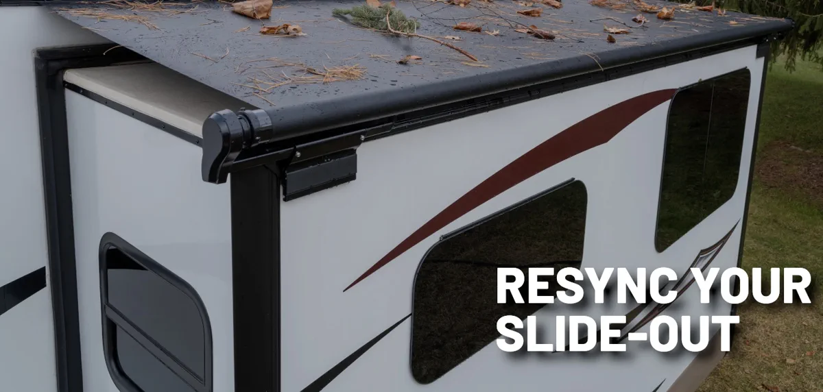 A1 RV Repair tech diagnosing a grinding slide-out noise during a current-draw test